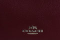 COACH Women's Polished Pebble Leather Dufflette LI/Black Cherry Shoulder Bag